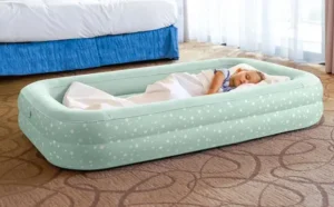 A Kid Sleeping in the Intex Travel Air Mattress Inflatable Bed