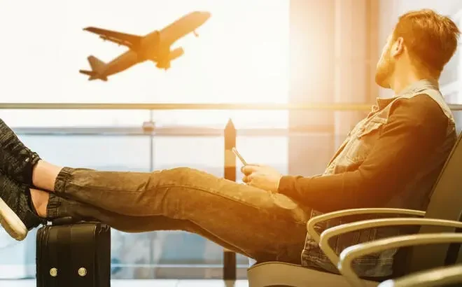 A Person looking at an Airplane
