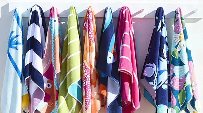 Beach Towels Hanging from Clothing Rack