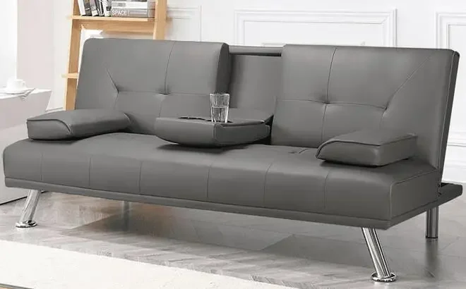 Renwick Modern Faux Leather Futon Sofa Bed in Grey Color in a Room